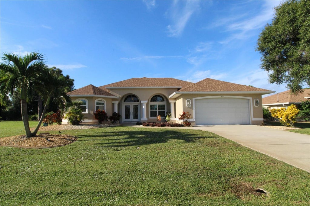 Photo of 614 Rotonda Circle, Rotonda West, FL 33947 (MLS # C7531318)