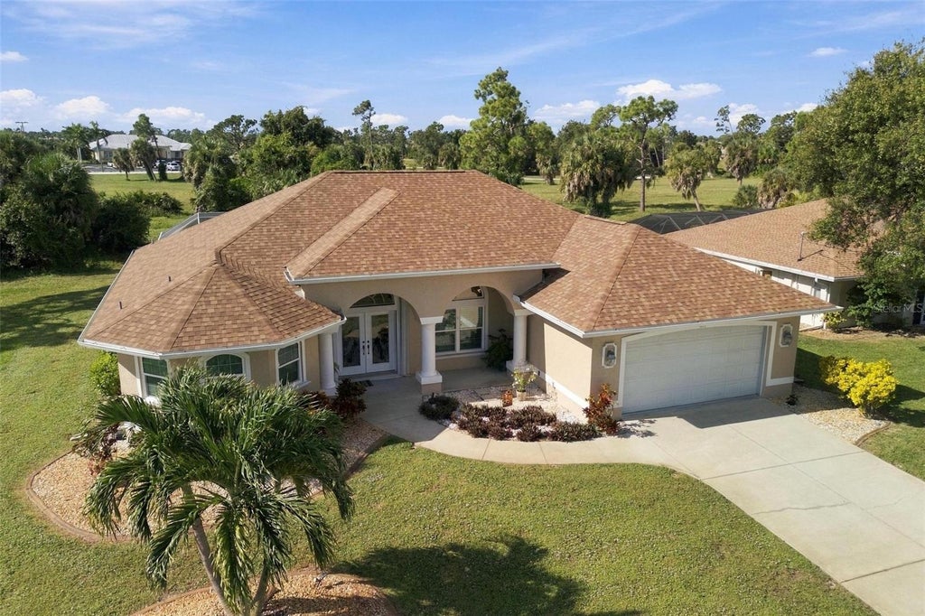 Photo of 614 Rotonda Circle, Rotonda West, FL 33947 (MLS # C7531318)