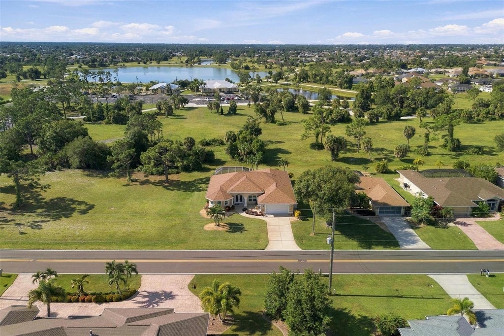 Photo of 614 Rotonda Circle, Rotonda West, FL 33947 (MLS # C7531318)