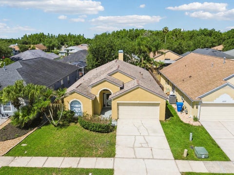 Photo of 1229 Crimson Clover Lane, Wesley Chapel, FL 33543 (MLS # TB8521097)