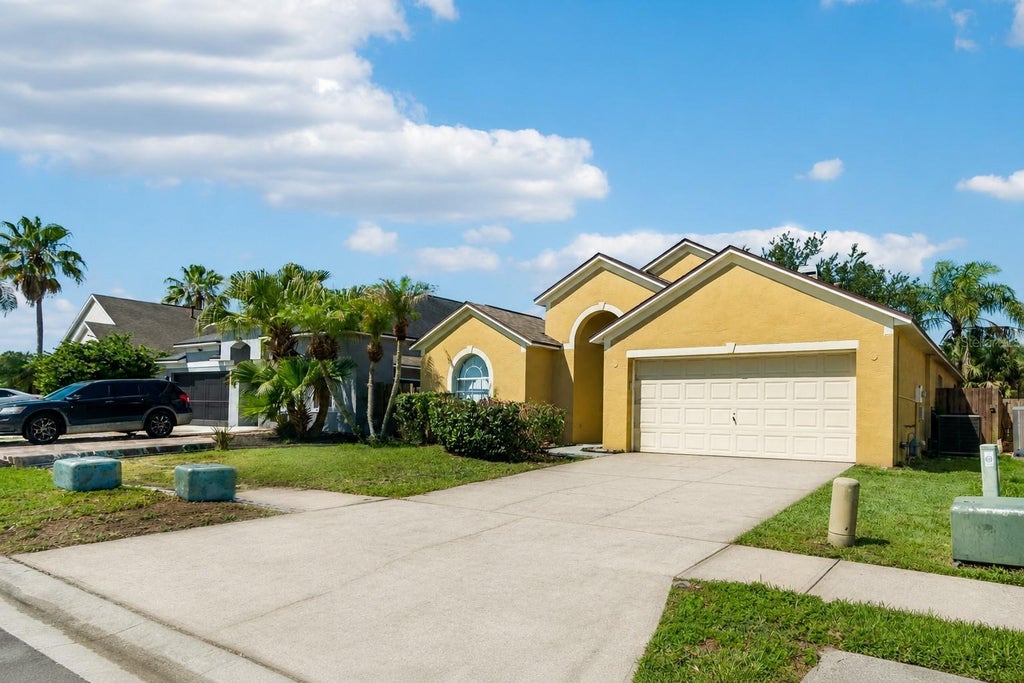 Photo of 1229 Crimson Clover Lane, Wesley Chapel, FL 33543 (MLS # TB8521097)