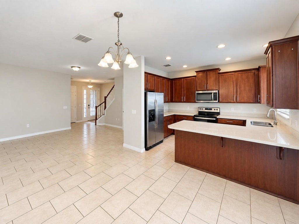 Photo of 9407 Tawnyberry Street, Orlando, FL 32832 (MLS # O6446450)