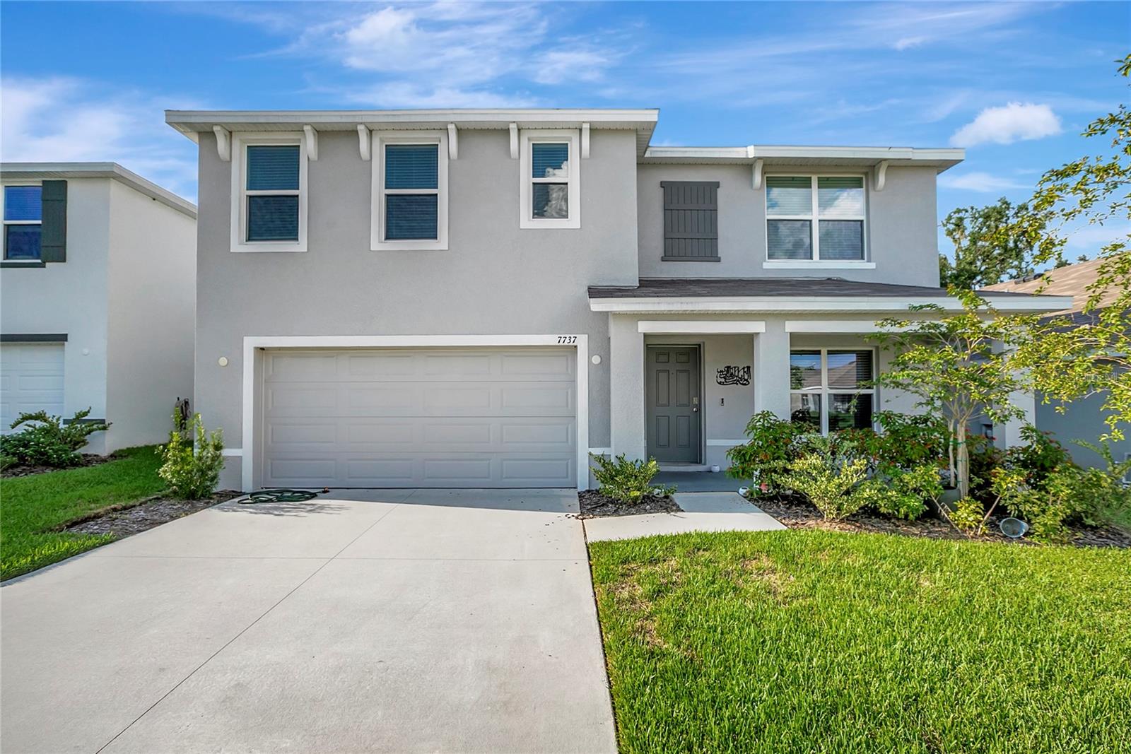 Welcome to this stunning Nearly New 5-bedroom, 3-bathroom home built in 2024, nestled in a newly developed community in the heart of Temple Terrace. This modern beauty boasts a variety of high-end upgrades and thoughtful features throughout. The guest suite on the first floor with a full bath adjacent makes this home very convenient for everyone. Step inside to an open-concept layout where the main living area features sleek tile flooring, providing both style and easy maintenance. The gourmet kitchen is a true standout, offering beautiful custom Quartz countertops that adds a touch of elegance. The spacious primary bathroom is an oasis with . At the stairs, you'll find luxury laminate flooring leading to a spacious loft—perfect for a home office, media room, or play area. The home's five generously sized bedrooms provide ample space for relaxation and privacy. . This home is located in a non-flood zone and backs to conservation with no rear neighbors, providing peace of mind for years to come. No CDD and an excellent location near USF, Moffit, I75, I-4 and Amazon. Don’t miss out on this exceptional property—schedule a tour today!