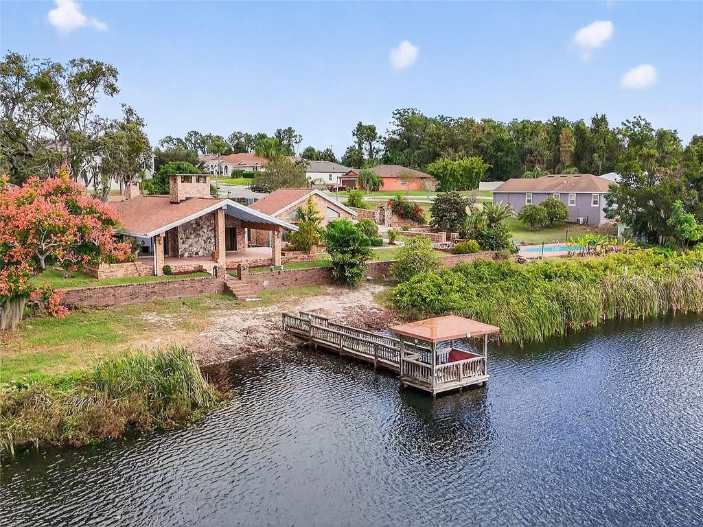 Photo of 1910 College Park Drive, Tavares, FL 32778 (MLS # G5103980)