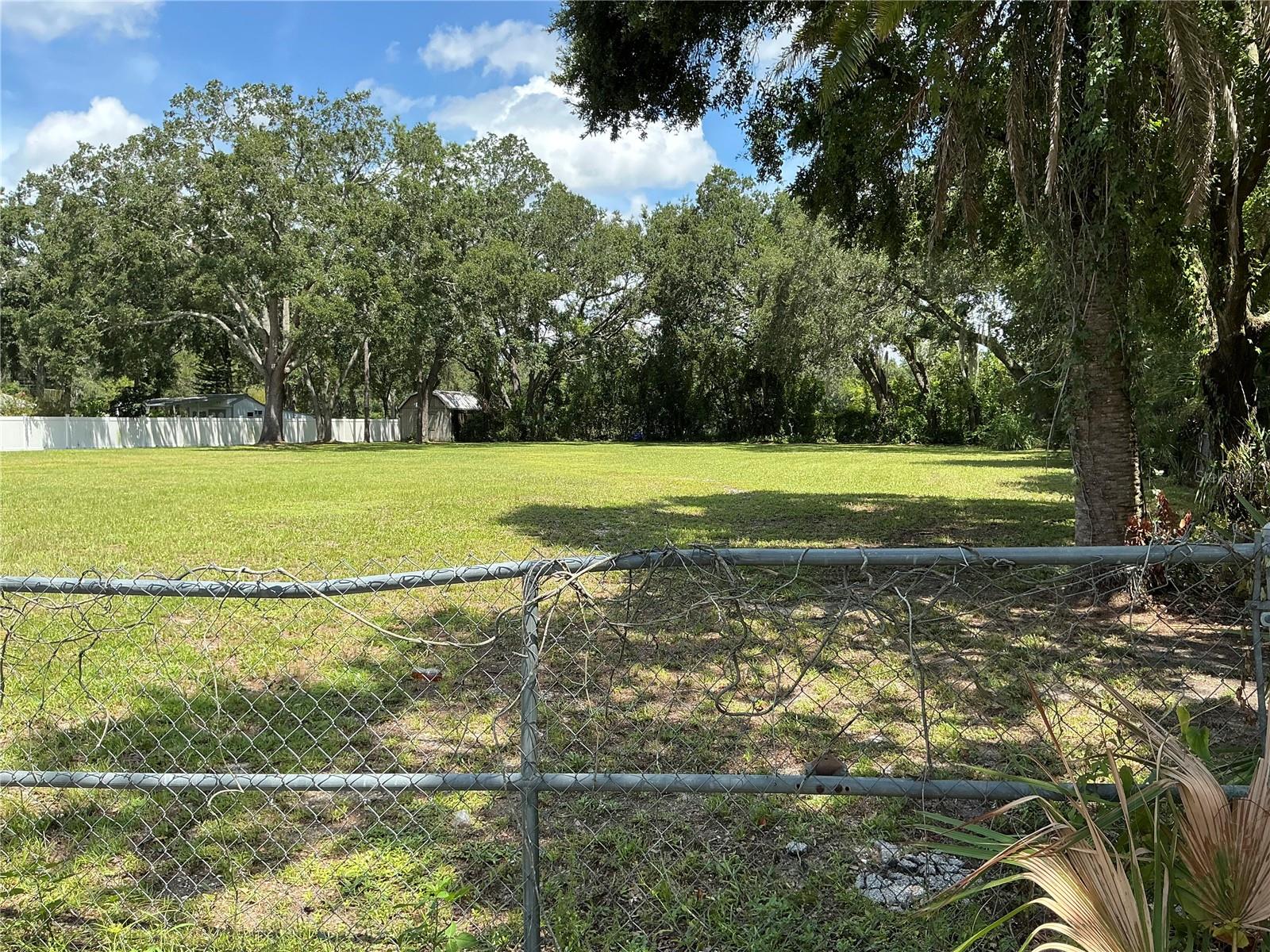 This vacant lot, just under ½ acre, is ready for your dream home. Zoned RSC-6, with water and sewer at the property. Easy access to 275 for quick commutes to top restaurants, shopping, and hospitals. USF is less than 13 minutes away. The adjacent lot is also for sale under MLS# TB841563, offering a great opportunity to own nearly 1 acre in a growing area of Tampa.