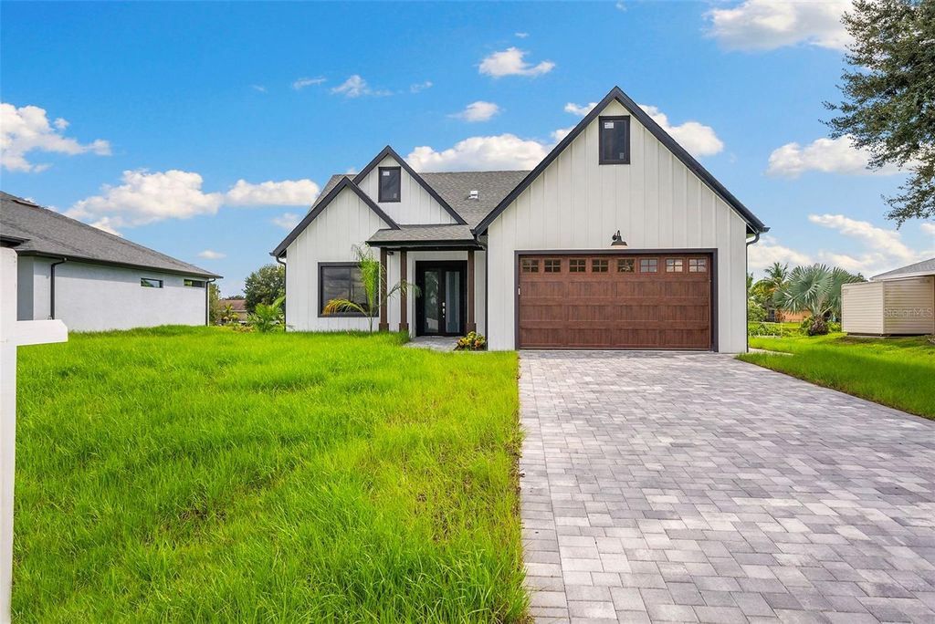 Photo of 4308 3rd Street SW, Lehigh Acres, FL 33976 (MLS # TB8362705)