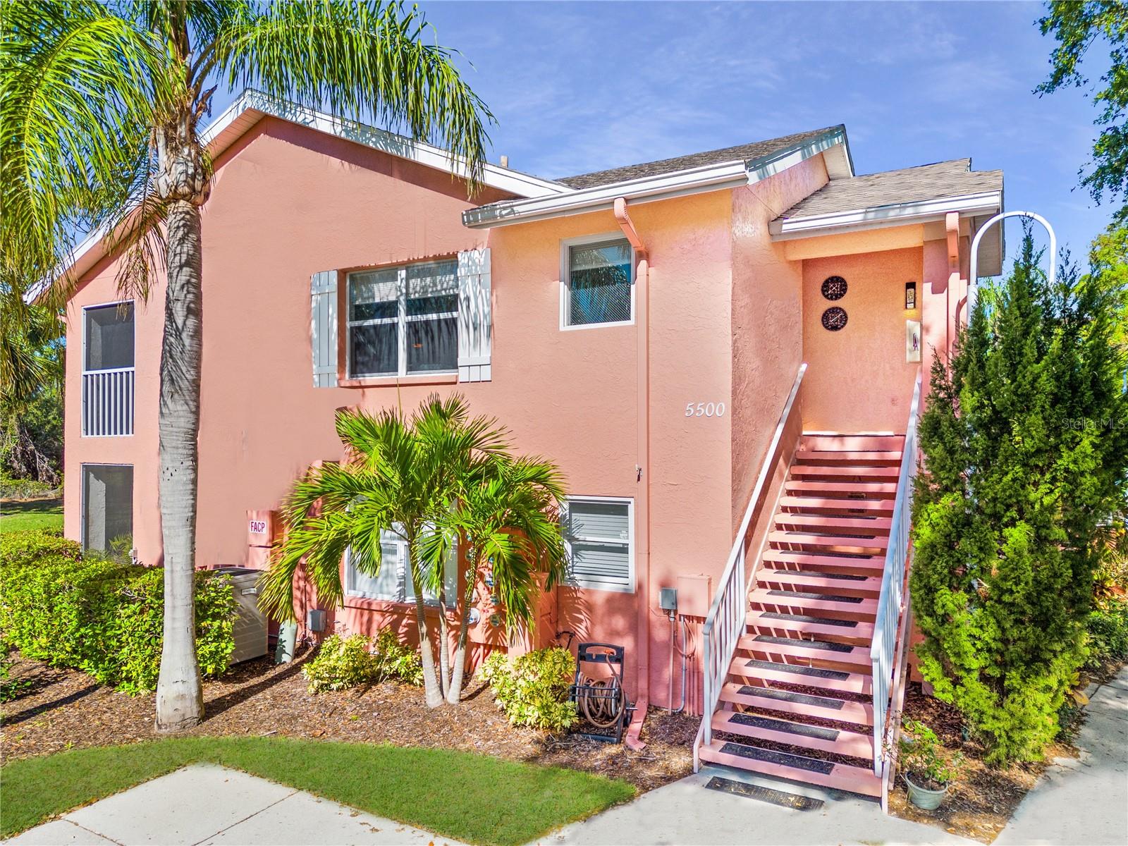 Welcome to your serene, second floor, 2 bedroom and 2 bath condo with a beautiful courtyard balcony view. This rarely available corner end unit offers plenty of open space including a kitchen with stone countertops and a breakfast bar, which overlooks the dining and living room areas. To add to it, you will find additional storage space with an in-unit washer and dryer closet close to the kitchen and a large walk-in closet nestled within in the primary suite. Located just minutes from University Town-center, you can be close to it all and yet experience a perfect balance when enjoying the peace and quiet of Magnolia Place. Set up a private showing to see this dreamy condo before it's gone!
