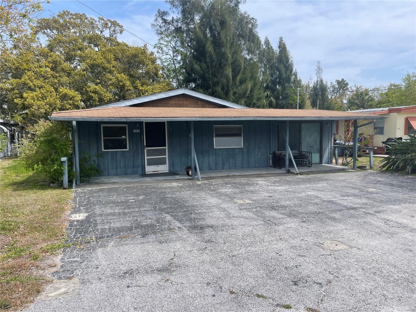MAJOR PRICE REDUCTION!!!___Offered at just $100,000—well below current tax-assessed and AVM values—**this waterfront property at 14612 Coral Drive in Hudson presents a compelling opportunity for experienced investors ready to take on a full-scale renovation.
Located in the Gulf Side Villas community, this home sits along a saltwater canal with direct access to the Gulf of Mexico, making it a prime candidate for redevelopment as a personal waterfront retreat or income-producing asset. The lot offers tranquil canal views and potential for outdoor living spaces tailored to Florida’s coastal lifestyle.
The structure sustained significant flooding and interior damage during the Fall 2024 hurricanes. Interior walls have been removed down to the studs, exposing the framing. No repairs have been initiated. The home will require a complete rebuild, including evaluation and likely replacement of electrical, plumbing, HVAC systems, insulation, drywall, cabinetry, and finishes. What remains is a blank canvas ready for transformation.
The existing layout offers approximately 1,184 square feet, with 3 bedrooms, 2 bathrooms, and covered porches at the front and rear. Whether the end goal is long-term rental, seasonal use, or resale, the possibilities are strong for those equipped to restore value.
This is a cash-only sale, intended for buyers with the resources and experience to navigate a full renovation. Located minutes from Hudson Beach, marinas, waterfront restaurants, shopping, and medical facilities, the property offers both short- and long-term investment potential.
Serious inquiries only—bring your vision, crew, and coastal know-how, and seize the chance to rebuild on the water.