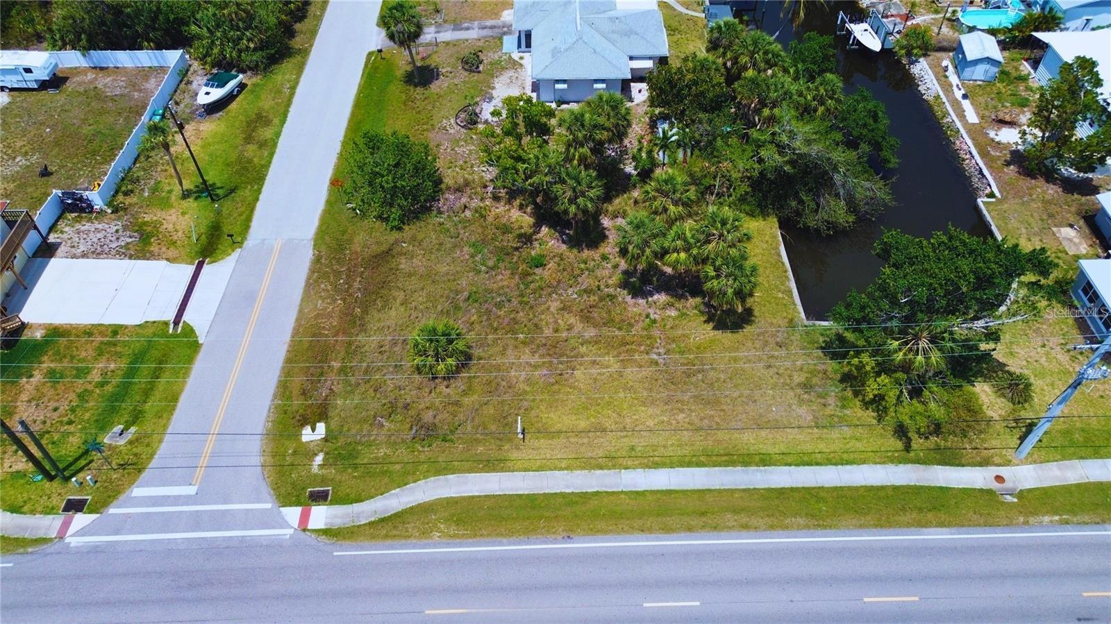 Enjoy excellent boating and fishing right from your backyard! This waterfront lot in Punta Gorda´s desirable Charlotte Park provides access to Charlotte Harbor. This oversized lot provides the perfect setting to build your dream home. Located just outside Punt Gorda city limits, this lot offers easy access to US-41, I-75, and Punta Gorda Airport making travel a breeze. The property is not in a scrub jay review area and is eligible for optional membership to the Charlotte Park civic association, granting access to a community boat ramp and a clubhouse. No deed restrictions or HOA fees.