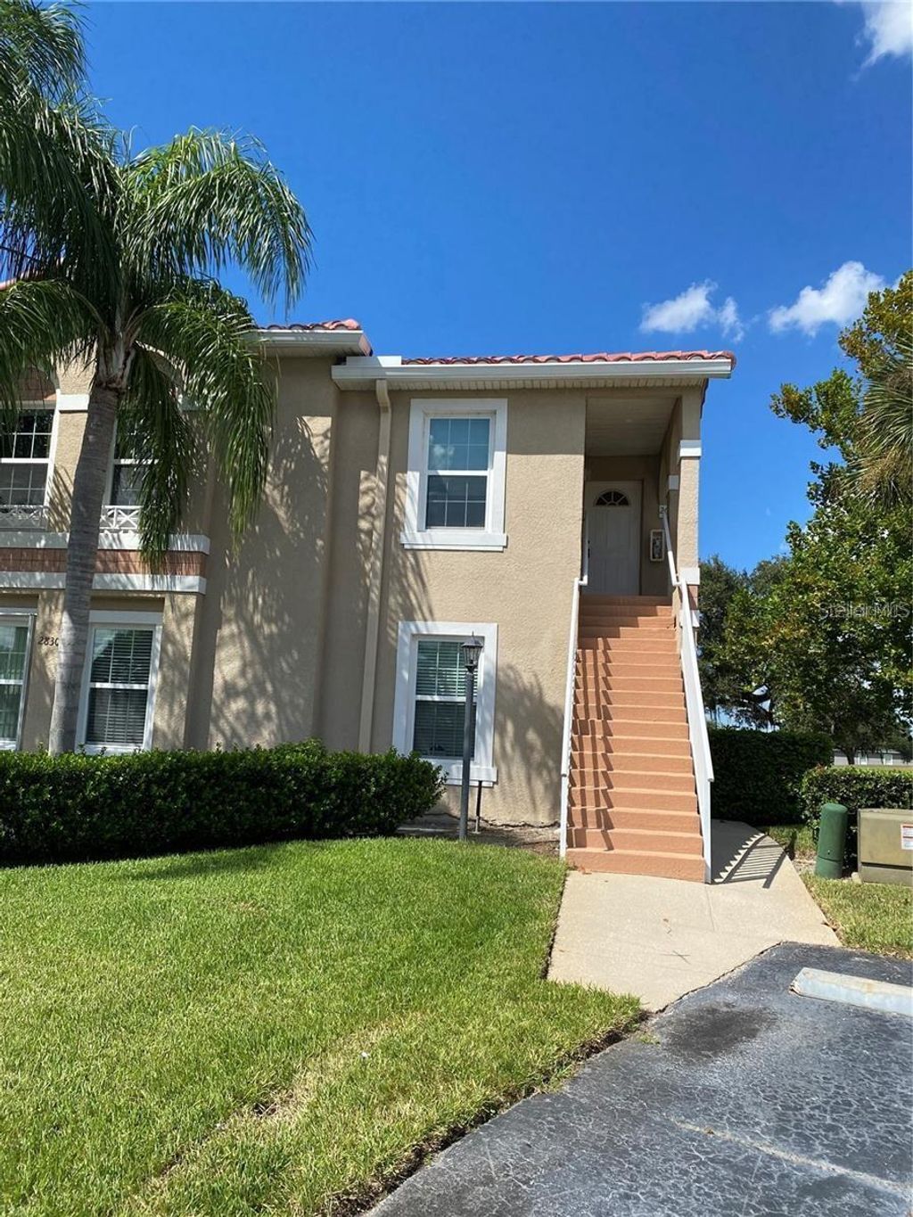 Photo of 2830 Osprey Cove Place #204, Kissimmee, FL 34746 (MLS # O6412595)