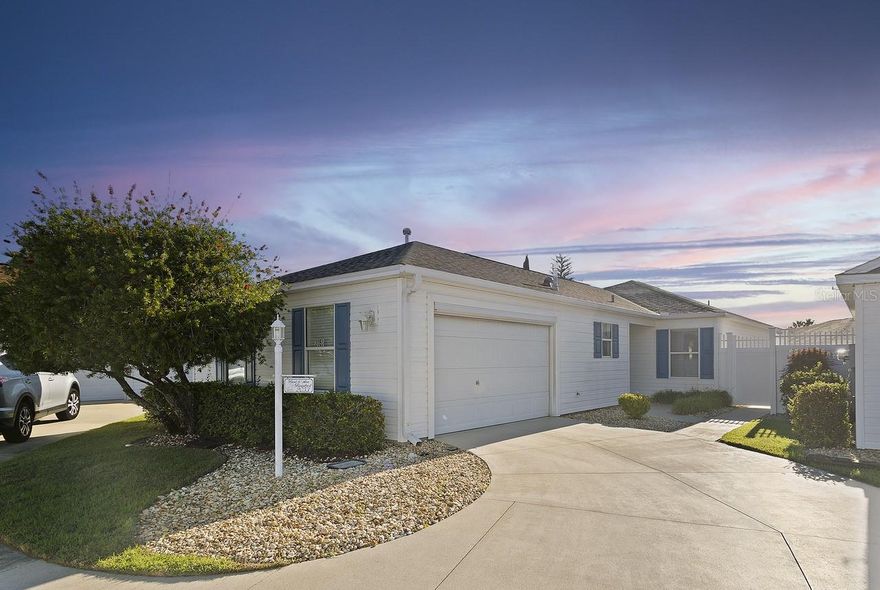 Welcome Home to This Gorgeous Bonita Courtyard Villa in The Village of Poinciana! Ideally located in one of The Villages’ most central and convenient neighborhoods, this beautifully cared-for 3 bedroom, 2 bathroom villa offers stylish upgrades, peaceful privacy, and true low-maintenance Florida living. You’ll immediately notice the impressive curb appeal with a painted and sealed driveway and charming landscaping that welcomes you inside.
Step through the front door into a spacious OPEN FLOORPLAN with VAULTED CEILINGS and LUXURY VINYL FLOORING throughout the main living spaces. Tile flooring has been added to the entry and lanai for durability and a finished look. The living and dining areas provide a comfortable layout for relaxing or entertaining, with natural light enhancing the bright and open feel.  You'll love the rear courtyard that is landscaped and enclosed for privacy. 
The well-appointed kitchen features stainless steel appliances replaced in 2023, ample cabinetry, and a convenient breakfast bar that keeps the chef connected to guests. A split bedroom layout gives the primary suite exceptional privacy, where you’ll appreciate the updated tiled  shower and generous WALK-IN closet storage. Two additional guest bedrooms with closets are perfect for overnight visitors, a hobby room, or a home office.
Outdoor living is a highlight here — the fenced private courtyard is the perfect sanctuary for morning coffee, evenings under the stars, or tending to potted plants. For added comfort and shade, a new Sunsetter awning has been installed. Two new Anderson sliding doors (2024) allow smooth access to the lanai and improve energy efficiency year-round.
Additional upgrades include ROOF 2023, HVAC replaced in 2020, Termite bond in place, and NO BOND remaining, giving you peace of mind and long-term value. This home is also offered TASTEFULLY TURNKEY, so you can immediately immerse yourself in The Villages lifestyle.
Conveniently close to Cane Garden Country Club, recreation centers, pickleball and pool facilities, medical services, shopping, and the fun and entertainment of Lake-Sumter Landing, this villa puts everything at your fingertips. If you’re looking for a move-in-ready home with modern updates in a fantastic location — this Bonita Villa is the one. Schedule your private showing today!  CHECK OUT THE VIDEO TOUR - CLICK ON THE TOUR LINK ABOVE TO WATCH !