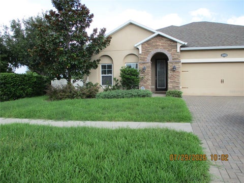Photo of 19093 Long Lake Ranch Boulevard, Lutz, FL 33558 (MLS # W7888084)