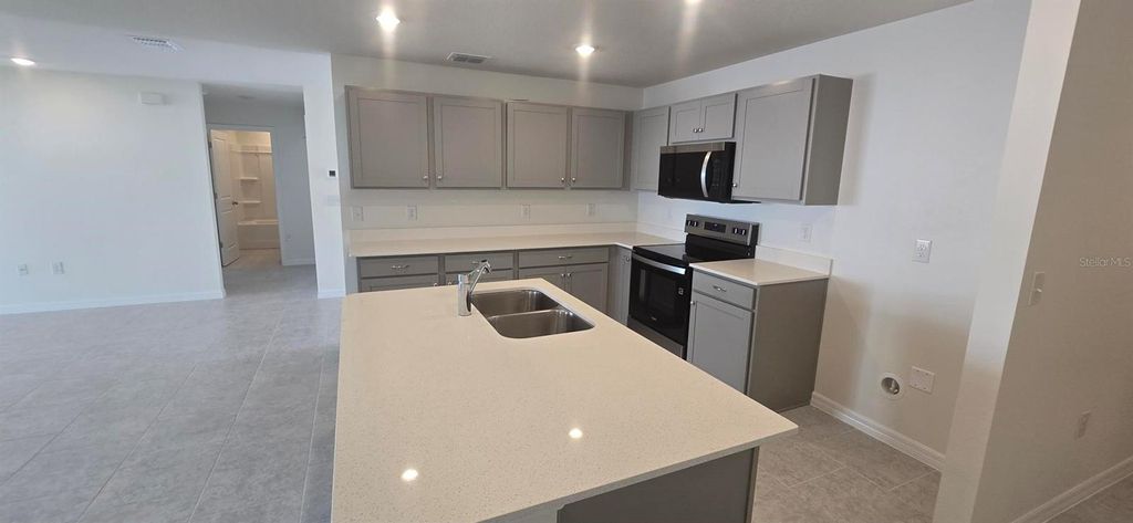 Photo of 184 Athabasca Drive, Poinciana, FL 34759 (MLS # C7522396)