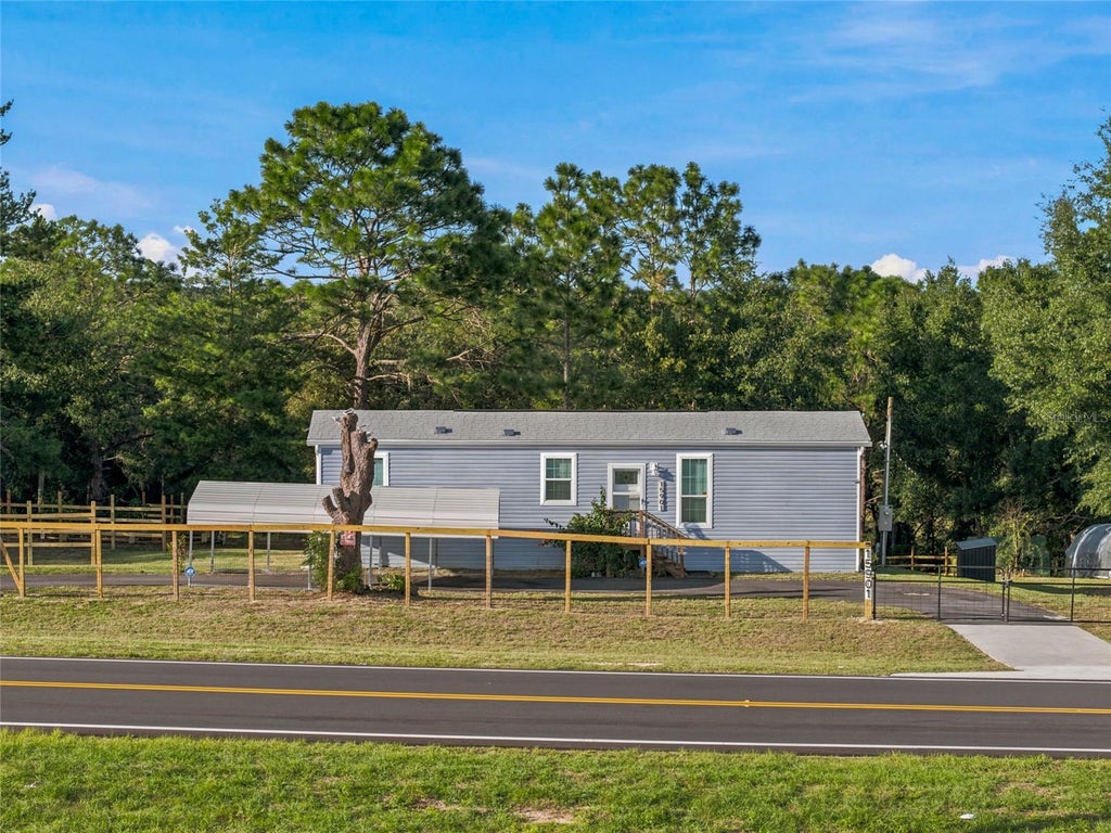 Photo of 15901 SE 113 St Rd, Ocklawaha, FL 32179 (MLS # OM734593)