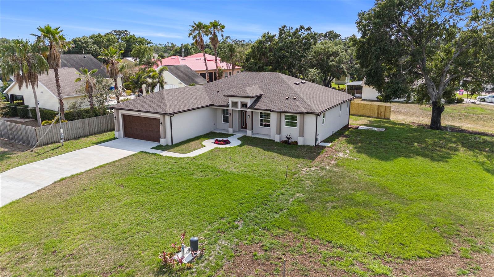 Brand-New Construction on Half an Acre – No HOA, No CDD!
Welcome to your dream home in the heart of Gibsonton! Situated on an oversized corner lot, this stunning new construction property offers the perfect blend of luxury, comfort, and freedom, with no HOA or CDD fees. Step inside to discover 4 spacious bedrooms, 3 full bathrooms, and a dedicated home office, ideal for today’s flexible lifestyle. The open-concept floor plan is thoughtfully designed to maximize space and flow, making everyday living and entertaining effortless. You’ll fall in love with the high-end finishes throughout, including quartz countertops, modern stainless steel appliances, and an oversized kitchen island perfect for gatherings. The kitchen is as functional as it is beautiful, featuring soft-close, solid wood cabinetry and elegant brushed gold fixtures. The primary suite is a luxurious retreat with vaulted ceilings, dual walk-in closets, and a spa-inspired ensuite showcasing a freestanding soaking tub, frameless glass shower, and double vanity. Additional features include ceiling fans in every room, a laundry room with built-in cabinetry and a utility sink, and plenty of natural light throughout. Step outside to your expansive backyard—ready for your vision. Whether you're dreaming of a pool, garden, or room to park your boat or camper, this space offers endless possibilities. The corner lot also gives you added privacy and flexibility for future enhancements. Conveniently located just minutes from I-75, you'll enjoy quick access to downtown Tampa, nearby shopping, dining, and entertainment—including a movie theater just around the corner.
Don't miss this rare opportunity to own a brand-new home on a large lot with no restrictions. Schedule your private tour today!
