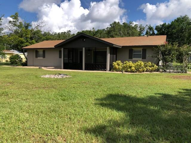 Looking for a home with no HOA’s that offers possibilities with a C-2A zoning, which offers many opportunities. This home is located on over a ½ acre, and the front screen patio is facing the fairway of the Mt Dora Golf Course that is open to the public. The home has newer luxury vinyl planking in a spacious living room with an abundance of natural light. 2 Bedroom plus a refreshed bathroom with new vanity. Ceiling fans and newer Ac unit that helps keep the house cool on these hot Florida days. Large garage with openers, laundry room area with a washer & dryer, plus another storage area. Have a boat; you can launch ¾ mile away on Lake Dora at Gilbert Park and store your boat at your home. The property has security camera’ and you may be recorded. The cameras do not convey with the property. Schedule an appointment today to view this unique home.