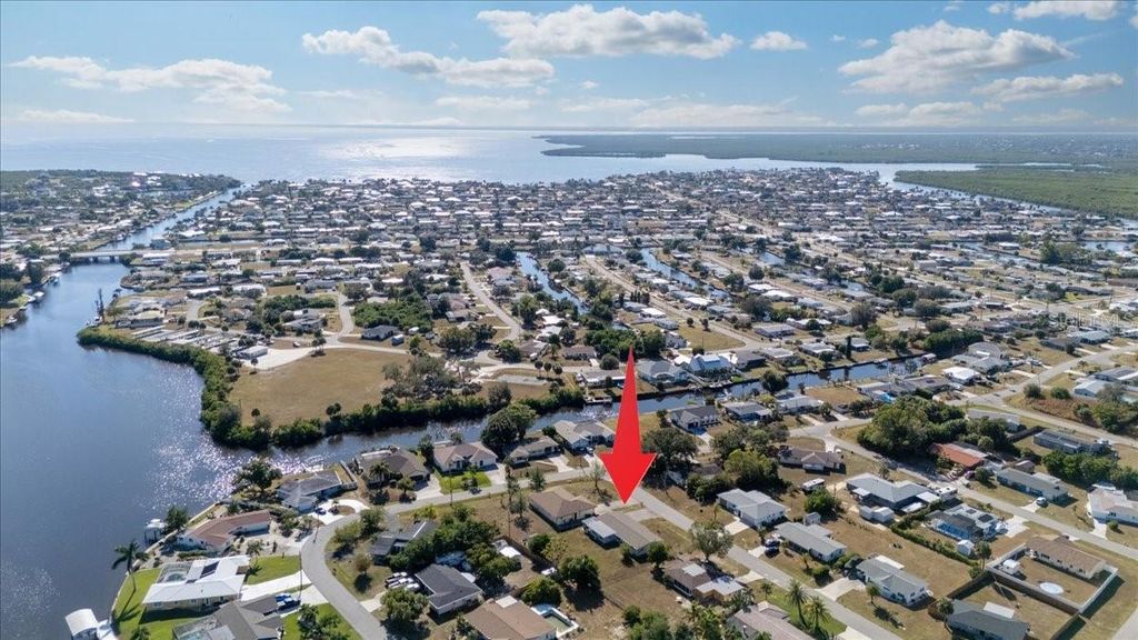 Photo of 151 Emmett Avenue NE, Port Charlotte, FL 33952 (MLS # C7517790)