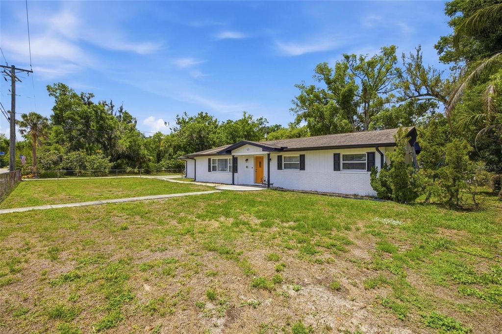 Photo of 521 W Lutz Lake Fern Road, Lutz, FL 33548 (MLS # TB8510014)