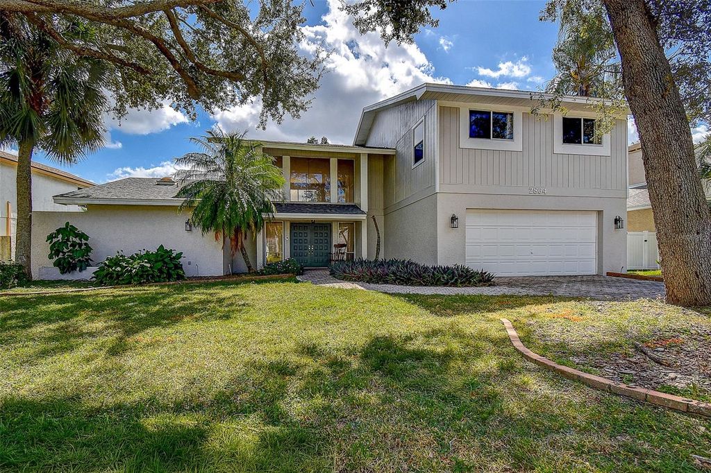 Photo of 2864 Lake Valencia Boulevard E, Palm Harbor, FL 34684 (MLS # TB8440359)