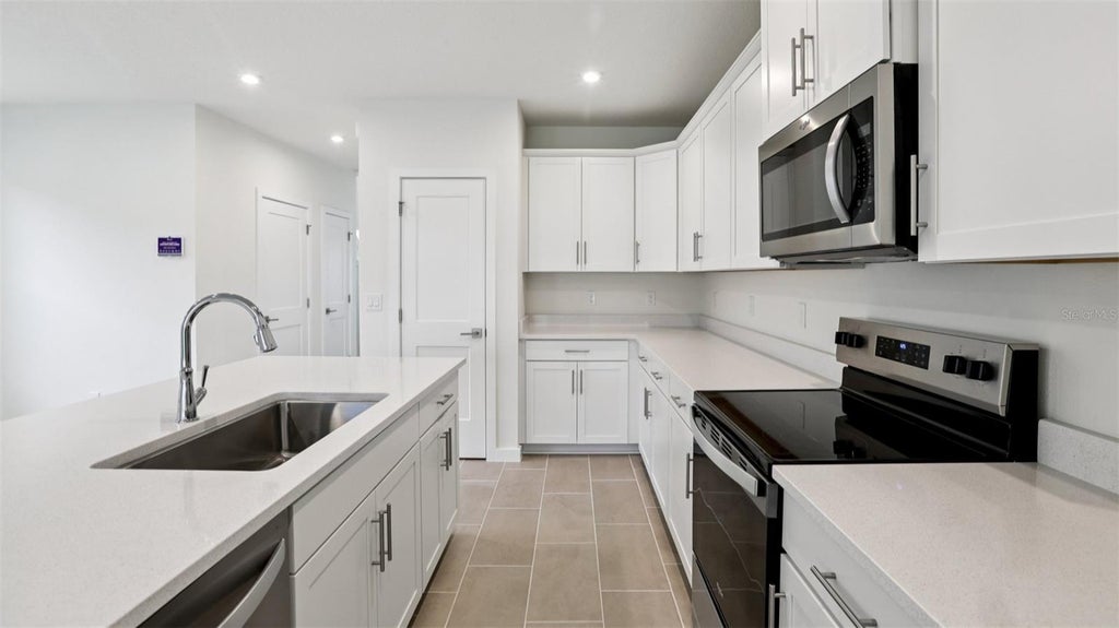 Photo of 3286 Cup Drive, Lakeland, FL 33803 (MLS # O6447460)