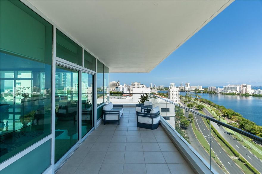 Elegant 11th-floor residence with 3 bedrooms, 3.5 baths, and approximately 3,005 sq. ft. of total construction. The layout features an open living and dining area with abundant natural light, private balcony with city and water views, and a well-defined bedroom wing.
The primary suite offers a spa-inspired bath and private balcony, complemented by two additional bedrooms with ensuite baths. A laundry room and three covered parking spaces add comfort and convenience.
The Cosmopolitan provides full amenities including concierge service, 24-hour security, infinity pool, landscaped outdoor spaces, executive conference room, lounge and bar, billiard room, play area, and fitness center.
Located in Miramar’s Arts District, the building is steps from the Condado Lagoon, beaches, fine dining, shopping, and cultural venues.