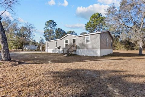 Photo of 1910 NE 155th Court, Williston, FL 32696 (MLS # OM717751)