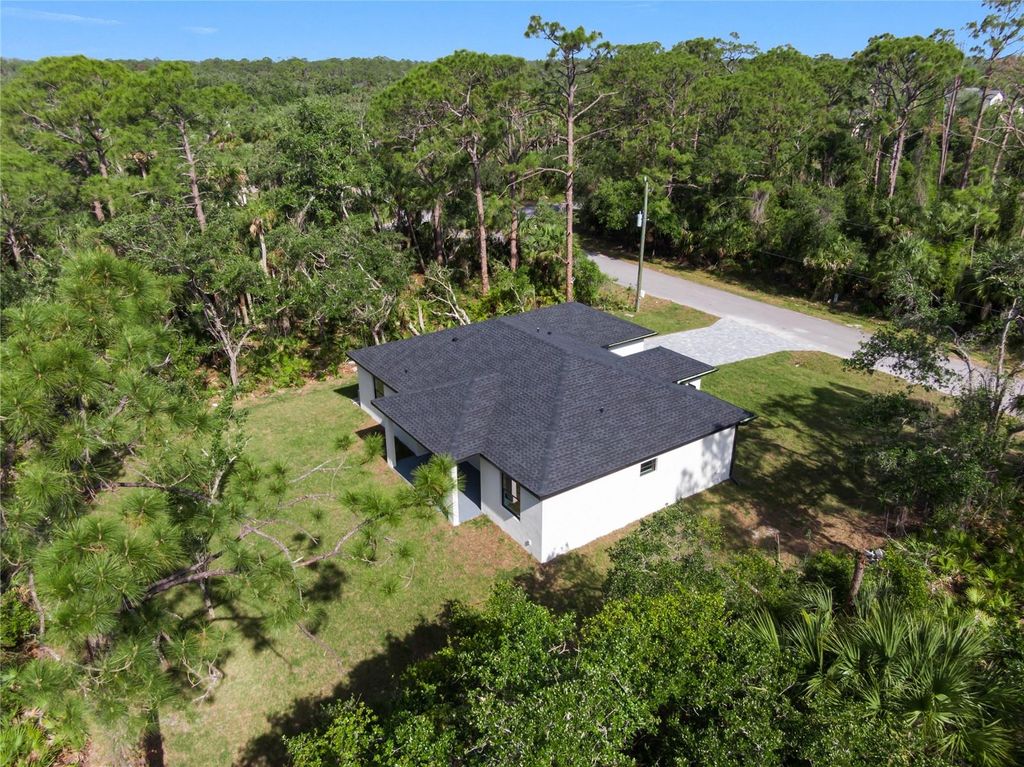 Photo of 14009 Daniels Avenue, Port Charlotte, FL 33953 (MLS # A4649931)