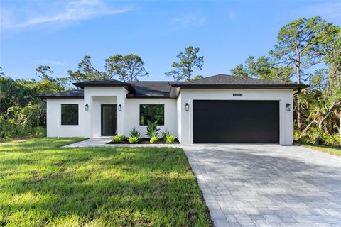 Photo of 14009 Daniels Avenue, Port Charlotte, FL 33953 (MLS # A4649931)