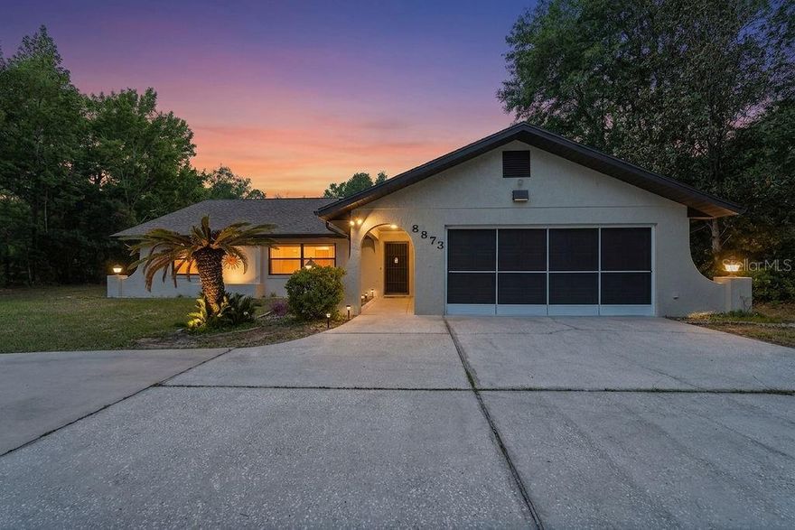 Welcome to 8873 SW 200th Cir—a charming single-family home nestled in a peaceful neighborhood. This property features a home remodel completed in 2024, including: whole house painting (inside and out); kitchen and bath granite countertops; luxury vinyl plank flooring throughout (no carpet); kitchen skylight and appliances (also in 2024). Roof replaced in 2015 (with ice shield covering entire roof), hurricane tie downs and leaf guards on gutters. Pool marcite re-done in 2019 along with new pool pump and solar panels to heat the pool (also 2019). Screen enclosure, including aluminum structure, replaced in 2016, and screens replaced again in 2024. Asphalt driveway replaced with circular concrete driveway in 2021.  Three storage sheds on the property.

The floorplan includes nearly 2,000 sf and a split bedroom design. The 400+ sf covered lanai provides a relaxing environment with two ceiling fans, a pool bathroom with shower, and leads to a 1300+ sf screened pool and pool deck.  One of two lanai exits lead to a small fenced area for pets. The 1+ acre property contains mature landscaping and privacy.  Community amenities include private beach access to the crystal-clear Rainbow River, as well as a private clubhouse with lending library, game room, billiards, oversized pool, fitness center, tennis, pickleball, basketball courts and Cheers Restaurant. Residents enjoy a quiet, friendly neighborhood atmosphere with convenient access to shops, dining, and essential services in Dunnellon and nearby Ocala. Come see all this property has to offer.