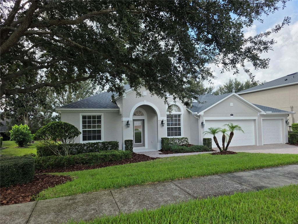 Photo of 1017 Harmony Lane, Clermont, FL 34711 (MLS # O6443876)