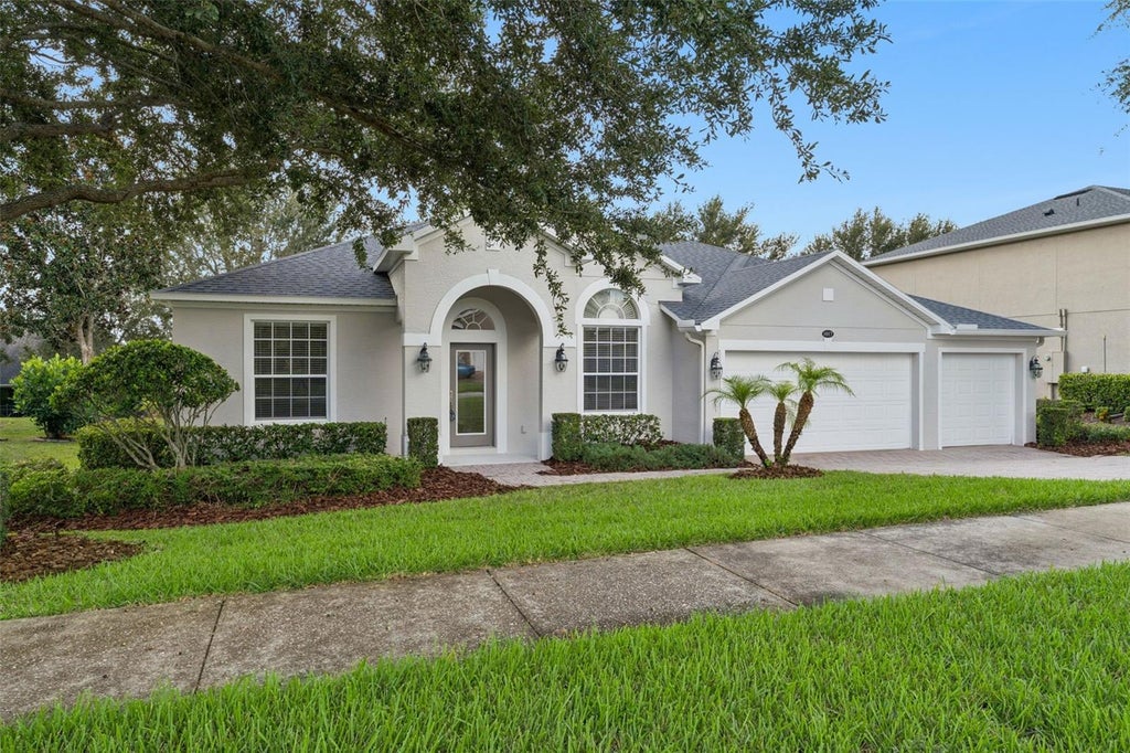 Photo of 1017 Harmony Lane, Clermont, FL 34711 (MLS # O6443876)