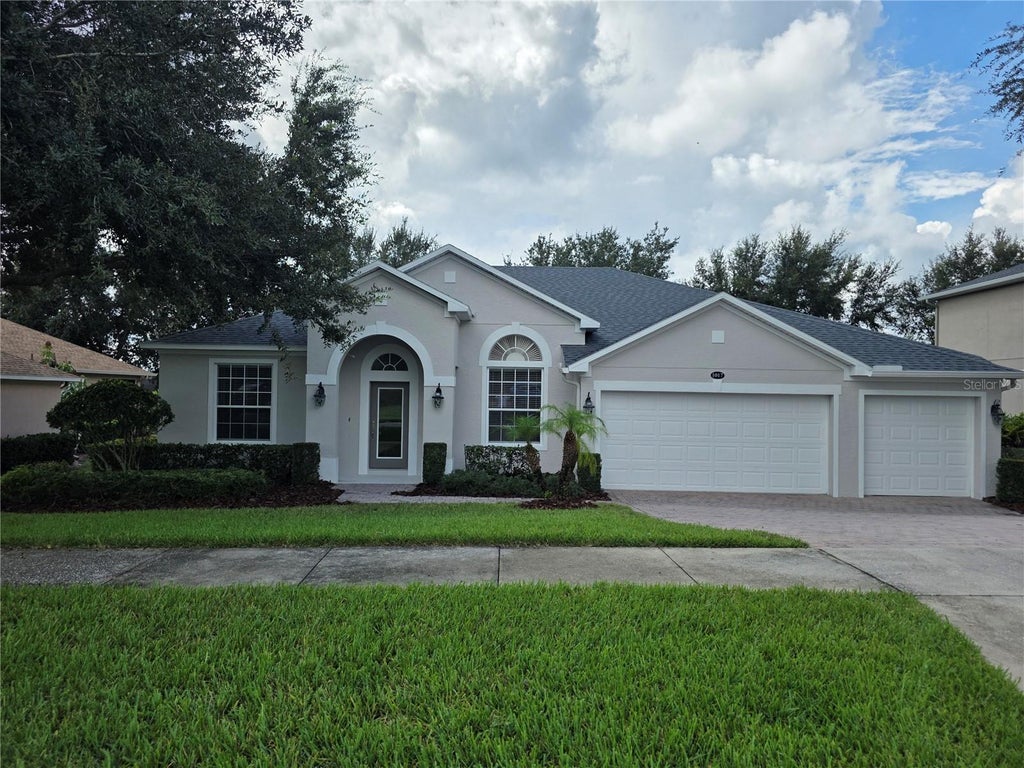 Photo of 1017 Harmony Lane, Clermont, FL 34711 (MLS # O6443876)