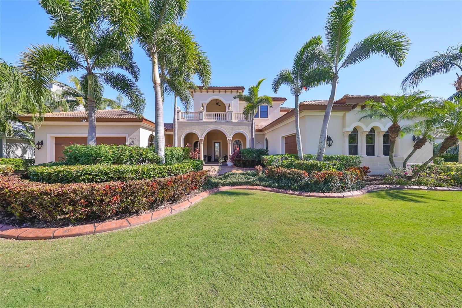 Welcome to your dream home, an exclusive John Cannon executive waterfront residence nestled on a sprawling half-acre within the prestigious Bay Estates of the Mirabay community. From the moment you arrive, the lush landscaping and stunning curb appeal invites you into a world of elegance and sophistication.
Step inside to be greeted by breathtaking views of the serene pool and formal living room, complemented by a grand iron spindle staircase that sets the tone for this exquisite layout. Abundant natural light floods the space, highlighting the meticulous craftsmanship throughout. The gourmet kitchen is a chef's paradise, featuring custom cabinetry, exquisite quartz countertops, and top-of-the-line appliances, including a professional-grade new Fulgor Milano range, Subzero refrigerator, Wolf convection wall oven and microwave, and Bosch dishwasher. Featuring a spacious custom-made closet pantry ensures ample storage for all your culinary needs.
The master suite, conveniently located on the first floor, offers a private sanctuary with sweeping water views and French doors that lead directly to the pool. Indulge in the luxurious master bath and enjoy the convenience of a generous custom-made closet.
Every corner of this home boasts incredible upgrades, including elegant crown molding, stylish wood plantation shutters, sophisticated lighting and ceiling fans throughout that enhance the ambiance. Additional features include a whole-house generator, a water filtration system with reverse osmosis, and 3 new AC systems and a mini-split unit in the small garage.
Upstairs you will find a guest suite, full bathroom, and a dream bonus room with a private balcony, where you can soak in the stunning sunsets that paint the sky in vibrant hues.
Step outside to discover your private lanai oasis, where every day is a celebration of nature and relaxation. Dive into the heated saltwater pool, unwind in the spa, or host gatherings in the outdoor kitchen equipped with a top-of-the-line grill. This space is perfect for entertaining against a backdrop of breathtaking water views. A private dock with a 14,000-pound lift awaits your boat! Spend your days exploring the scenic waterways, casting a line for your next catch, or paddling through tranquil waters in your kayak!
This expansive lot offers unrivaled privacy with a fully fenced side-yard, making it a perfect retreat.
Experience the ultimate luxury lifestyle in a neighborhood that boasts state-of-the-art amenities, including a resort-style pool, playgrounds, tennis and pickleball courts, and a boat ramp. This remarkable waterfront home is waiting for you to call it your own.