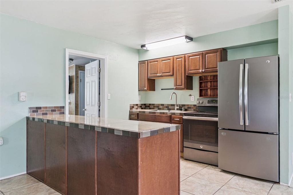 Photo of 983 Brookwood Ct S, St Petersburg, FL 33707 (MLS # TB8433333)