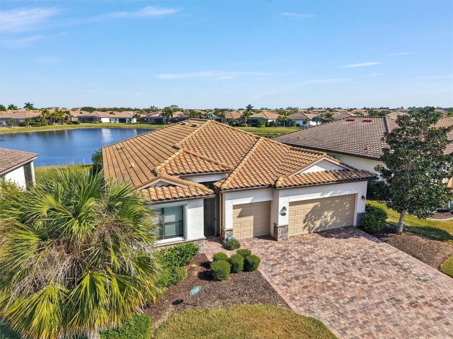 Stunning Lakefront 4 Bedroom, 3 Bathroom, 3 Car Garage Home in the Prestigious Gated River Strand Community within the Heritage Harbour District of Bradenton.  This Upscale Dream Home has so much to offer starting with the Paver Driveway and superb Landscape.  Inside the Home, it feels Light and Bright.  It is configured for both Entertaining Guests and Personal Time.  The Kitchen is magnificent with Granite Counters, Stainless Steel Appliances, Tall Cabinetry with Crown Molding, a Prep Island perfect for Barstools, and a Breakfast Area.  Relax in the Living Room and enjoy the beautiful Views of the Lake.  The Primary Bedroom is an Oasis – Crowned Molding, a Ceiling Fan, Walk-in Closet with Custom Shelving, and an En-Suite Bathroom.  The Primary Bathroom features a long Vanity with 2 Sinks, a Garden Soaking Tub, a Glass Enclosed Walk-in Shower, and a Toilet Closet.  2 additional Bedrooms share a Full Bathroom with Dual Sinks and a Tiled Tub-Shower while the 3rd Bedroom has an En-Suite Bathroom.  All have large Closets and are immaculate.  Enjoy the Outside year-round from the Screened Rear Patio overlooking the Lake.  True Resort Living at the River Strand Golf and Country Club.  It features a 27-hole Golf Course, 9 Har-Tru Tennis Courts, 8 Pickleball Courts, 2 Club Houses with Pools, a Restaurant, a Fitness Center, and many Social Activities.  Pets permitted (pet screening and owner approval are required) with $50/month Pet Rent.  The property is Professionally Managed and Maintained. There is a one-time $150 Administration Fee and $75 Application Fee for each applicant 18 years or older.  One-time $359 Access Fee to Country Club.  Applicants should have a minimum 650 Credit Score, Gross Monthly Income of at least 2.5 times the Monthly Rent, and stable Rental History (no Evictions or Tenant Collections).