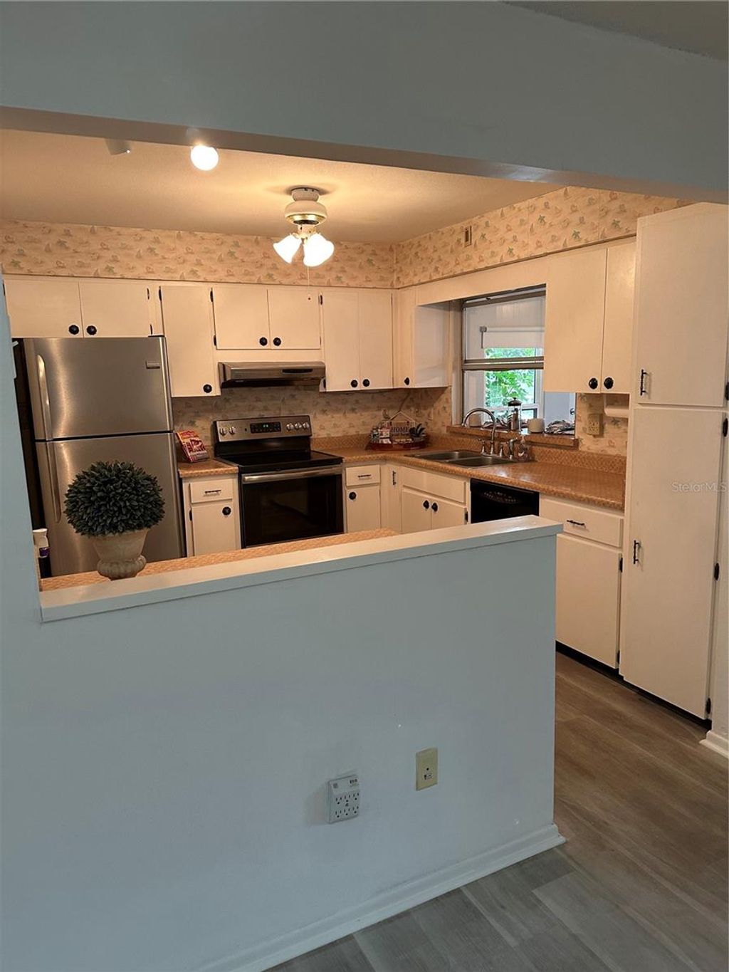 Photo of 200 Portree Drive, Dunedin, FL 34698 (MLS # TB8374637)