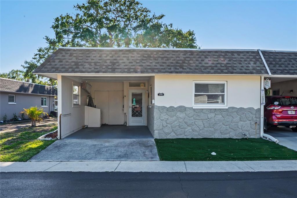 Photo of 200 Portree Drive, Dunedin, FL 34698 (MLS # TB8374637)