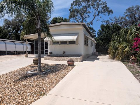 Photo of 6641 Kumquat Drive, New Port Richey, FL 34653 (MLS # TB8483591)