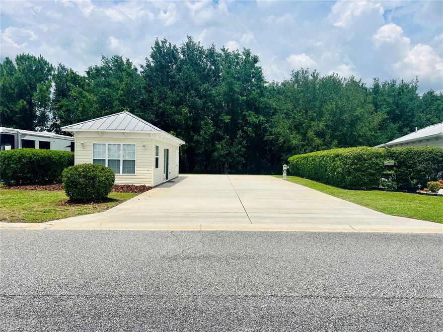 Lot 233 at Florida Grande Motor Coach Resort is a great find offering privacy, space, and 
flexibility in one of Florida’s most sought-after Class A resorts. This back-in lot features a 
spacious 26' x 76' concrete pad with full hookups, easily accommodating even the largest 
motorcoach and tow vehicle with plenty of room left over. Tall, manicured hedges define 
the property lines and provide a sense of seclusion, while a thick border of resort-owned 
trees at the rear creates a peaceful natural backdrop with no rear neighbors in sight. 
The lot is a blank slate with no landscaping, making it the perfect opportunity to design and 
personalize your outdoor space exactly how you want it. Out back, an outdoor shower 
makes it easy to rinse off your pup after a run at the dog park or clean up after a day 
outside. The 384-square-foot furnished casita provides comfortable indoor living with a 
clean, modern touch. Inside, you’ll find granite countertops, a full-size refrigerator, a 
kitchenette with ample cabinetry, and a full bathroom. Double doors at the back open up to 
a screened storage area, allowing fresh air to flow through the space on warm, sunny 
Florida days. 
Florida Grande offers more than just a place to park — it’s a vibrant, welcoming 
community. Winter seasons are filled with activities like line dancing, book club, RV chats, 
trivia nights, card games, and community dinners. Grab a plate at one of the regular food 
truck events or enjoy breakfast with friends on Saturday mornings. Live music, happy 
hours, and themed socials make it easy to connect with neighbors and enjoy resort life to 
the fullest. 
Exciting updates are happening across the resort. The 20,000-square-foot clubhouse is 
being refreshed, and the pool and deck are getting resurfaced. Best of all, the brand-new 
eight-court pickleball complex is now open and ready for play, adding another dynamic way 
to stay active and social right on site. 
With so much to do within the resort, it’s easy to stay entertained — but if you’re up for 
exploring, the options are endless. Spend a day with the manatees on the coast, take a 
glass-bottom boat tour at Silver Springs, or cycle the scenic 42-mile Withlacoochee Trail. 
Local wineries, parks, and charming small towns are just a short drive away, and major 
hubs like Orlando, Tampa, and Ocala are all within an hour. 
Lot 233 is your chance to enjoy all the perks of Florida Grande in a premium, private setting. 
Properties like this don’t come along often — especially at this price. Come see it for yourself before it's gone!