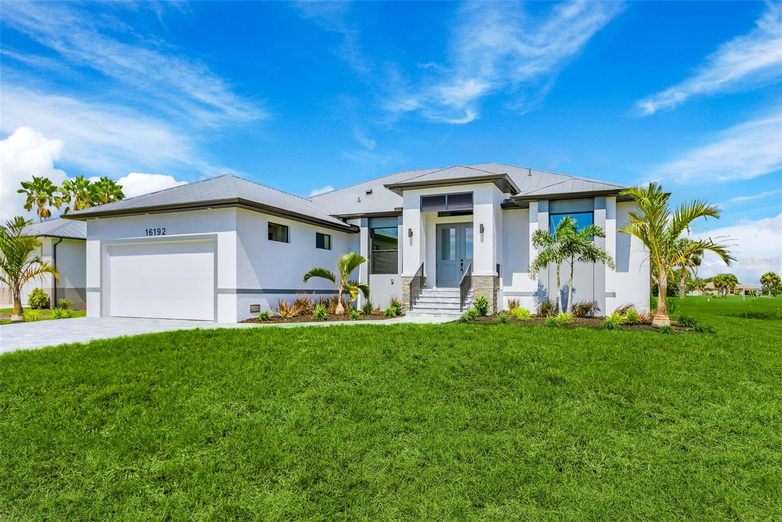 *NEW CONSTRUCTION POOL HOME* Come see this Customized Builder spec home that is conveniently located in the highly sought after Burnt Store Lakes Community! If peace and quiet along with amazing water views from rear of home that wrap around to the front is what you're looking for, then it doesn't get much better than this!
This quaint 3+Den/3 bath Pool Home has many "convenience" upgraded features that are easily noticed upon walking through the front doors. Some notable upgraded features (inside) include: Impact Glass throughout, high end Samsung Smart Appliance package, tastefully selected Lighting & Fan package, Black Jacuzzi Tub in Master bath- with hand held wand feature, huge walk in shower with large bench, Custom wood shelving (Uppers & Mid's) in closets, Level 3 Granite, Luxury Vinyl plank flooring throughout, dove tail soft close cabinetry with additional cabinets for storage on back side of kitchen Island..as well as (2) pop up outlets/I-phone charging stations also located on kitchen Island.
Notable (exterior) features include: Privacy wall stubbed out with water & electric for future outdoor kitchen.. which also doubles for privacy just outside the master bedroom, fully automated Pool feature that gets programmed once Wi-Fi is brought to the home, "Picture frame" pool cage, custom wood-like vinyl planks on lanai ceiling, Brick paver driveway, Beautiful Rain Glass double entry doors, hand rail up the steps leading to front door as well as down from Pool lanai to rear of property, custom Bahama shutter above front entry, accent brick on front pillars, Epoxied garage floor, Metal Roof & Flat panel garage door!
When living in the Burnt Store Lakes Community, you're able to enjoy the 11 man made/fish filled Lakes, large park area with pavilions for your afternoon picnics, Canoe/Kayak launch & a fishing pier if you decide to throw a couple lines in the water! The neighboring community (Burnt Store Marina) offers membership options to their public Golf course, fitness center, two restaurants & what is noted as the largest deep water (boat launch and storge) Marina in SWFL! Transient location being just 20 minutes to Downtown Punta Gorda or to the heart of Cape Coral.
Last but not least - for peace of mind. The existing home elevation sits 1.5 feet higher than the latest FEMA requirements for new construction! All Builder and Mechanical warranties will also convey with the sale of home.