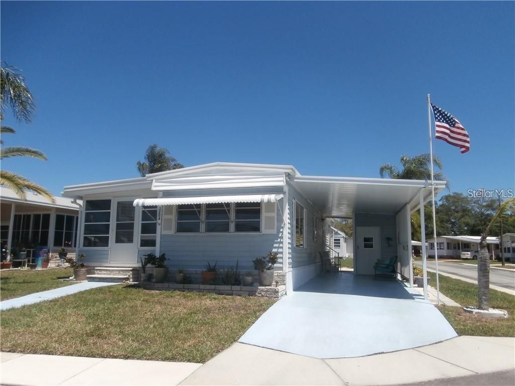 Photo of 3204 Channing Drive, Holiday, FL 34690 (MLS # TB8490231)
