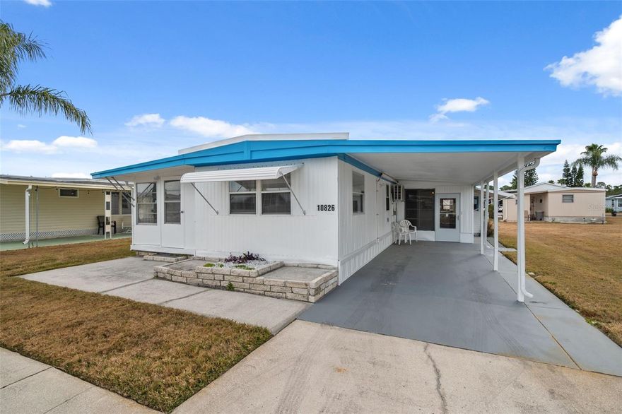 WELCOME TO YOUR SUPER HOME at 10826 Tioga Dr, Port Richey in the gated community of Senate Manor, a 55+ cooperative community in SUNNY Florida. This 1973 lovely 1 bedroom + large FL room (easy 2nd bedroom), 1 bathroom RENOVATED mobile home lies on a nice lot with over 4000 sqft in a NO CDD zone. Key exterior features are covered carport parking, 2 entrances into the home, rain gutters & easy-breezy TROPICAL landscaping with a pair of MAJESTIC palm trees framing the LOVELY HOME. More PHENOMENAL features are hurricane shutter for some of the windows, vinyl base skirting around the perimeter to prevent unwanted critters & a wide open yard to design your OUTDOOR DREAM OASIS. When you step inside, you'll LOVE the OPEN FLOOR PLAN consisting of the eat-in-kitchen, living & dining rooms & SPACIOUS Florida room. This REMODELED HOME is NEW, FRESH & READY FOR THE LUCKY BUYER! The water-resistant floors are dressed with laminate throughout the home for fluidity of design. The custom kitchen features a stainless steel double sink, solid wood cabinets with handles, expansive laminate counters & updated appliances including a smooth-top glass range, range vent & fridge. NATURAL SUNSHINE streams inside through the multiple windows ILLUMINATING the interior together with light fixtures. The primary bedroom can fit queen-size furniture & has a fan & ample closet space with 6-panel sliding closet doors. The generous-sized NEW bathroom features plentiful storage options, NEW vanity with cultured marble counter & OVERSIZED step-in shower with shelving. The Florida room with built-in AC UNIT can be set up as a 2nd bedroom & adds 140 sqft to home for a heated/cooled area of 692 sqft not reflected in public records. The laundry room with WASHER & DRYER INCLUDED & bonus utility sink is located in storage shed/workshop area. TWO, ENERGY-EFFICIENT, MINI-SPLIT AC SYSTEMS with remote control cool the home & provide heat on the cooler nights. One mini-split system is located in the living room while the other is in the primary bedroom. This home did sustain flooding from Hurricane Helene. The owner had it expertly remodeled using the services of a licensed contractor who pulled the proper county permits for the renovation. All permits have been closed out by the county with a final inspection & the mobile passed county inspection. This AMAZING home is better than it ever was before & ready for immediate enjoyment! Senate Manor is a WONDEFUL 55+ COMMUNITY & included in the low HOA fee of $200/month is trash with recycling pick-up 2X week, all exterior lawn maintenance, water, sewer, street lights, water with fountain views, gates & recreational activities like HEATED POOL & SPA, shuffleboard, horseshoes & gym. There is optional storage for boats, RVs or trailers on site. Location is IDEAL near beaches, shopping, restaurants, medical plazas, places of worship & tourist attractions. MAKE THIS YOUR FUTURE HOME!