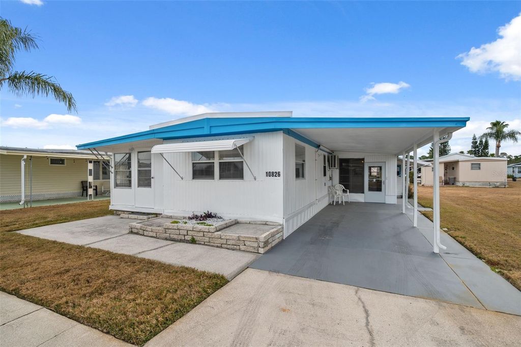 Photo of 10826 Tioga Drive, Port Richey, FL 34668 (MLS # W7877272)