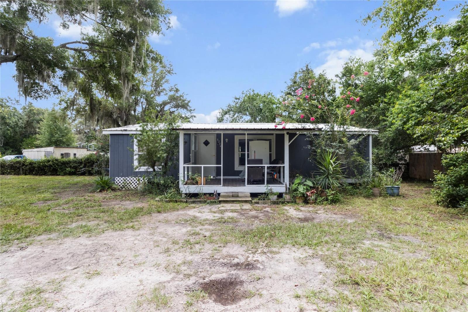 Whatcha talking about Willis? Well this home on Willis is one to talk about. The owner has put thousands of dollars into bringing this home back to life and now it is available for you to snatch it up at an amazing price. Affordable homes on acreage is hard to find these days. Inside you will find 2 bedrooms, 2 bathrooms, a fully enclosed porch / laundry room (just off of the kitchen) and beautiful custom kitchen. One of my favorite features of this house is the kitchen. The butcher block wraps all the way around and features new black appliances. Outside you will love the quiet, serene, space that makes up the fully fenced in yard. A large garage/ barn is deceptively spacious from the outside and sits right next to a 12ft tall RV/boat carport. Near by there is so much to do and see. There are many trails, boarding and training locations all around. There are some awesome local fishing spots to explore, great biking trails and bird watching sanctuaries near by. You will be close enough to the water to enjoy and far enough away to be safe (HIGH AND DRY). Don't miss scallop season. Some of the best fishing in the world can be found in our rivers, lakes and bays. you can catch a bass, crappie, trout, red fish, snook, grouper, mackerel, black sea bass and scallops.... all on the same trip. Bring your pole, goggles, scallop bag and more to stay busy year round. There are plenty of fantastic options when it comes locally owned cuisine and shops that are sprinkled throughout the area. Citrus County will be a joy to visit and certainly worth a second look! Also, the centralized location makes for a short trip to Ocala (HORSE CAPITAL OF THE WORLD), Gainesville, Tampa, St.Pete, Orlando and the rest of the beauty that Central Florida has to offer. Citrus county has 9 public and 5 private golf courses for your playing pleasure. Among those courses is the world renowned Black Diamond and the recently built Cabot Farms. All courses are a short drive away.