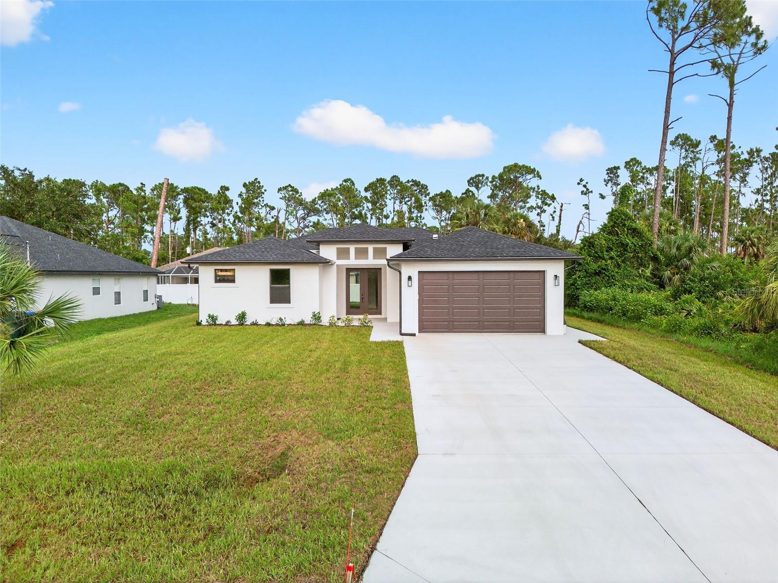 Experience elevated Florida living in this beautifully crafted 3-bedroom, 2-bath home with an ADDITIONAL multi-use private room, thoughtfully designed by a private builder focused on quality and attention to detail. Set on a large open lot in one of North Port’s fastest-growing areas, this custom home stands out with high-end finishes, a smart layout, and exceptional convenience.
Step inside and be welcomed by tall ceilings, an open and airy floor plan, and waterproof laminate flooring throughout—both stylish and built to last. The home is filled with natural light, thanks to numerous windows thoughtfully placed throughout, creating a warm and inviting atmosphere in every room.
The stunning kitchen is the heart of the home, featuring a large island, modern fixtures, and premium appliances, ideal for everyday living and entertaining.
A private office provides a quiet and functional space for work or creativity, while both bathrooms feature gorgeous designer tile for a spa-inspired touch.
One or more photos have been virtually staged.
Step outside to a spacious covered patio perfect for relaxing or hosting friends and family. The backyard includes a vinyl privacy fence along the back, offering just the right balance of openness and seclusion. The oversized driveway offers plenty of space for vehicles, toys, or guests, making everyday living and entertaining effortless.
Additional highlights include hurricane-impact windows and doors, underground utilities, and a location that’s not in a flood zone—giving you comfort and peace of mind.
Located just minutes from the brand-new Costco, shopping, dining, Wellen Park entertainment, and a short drive to some of Florida’s most beautiful Gulf Coast beaches, this home delivers the lifestyle you’ve been waiting for.
Custom-built homes like this don’t come around often—and they don’t stay on the market long. Schedule your private tour today and make it yours!
One or more photos have been virtually staged.