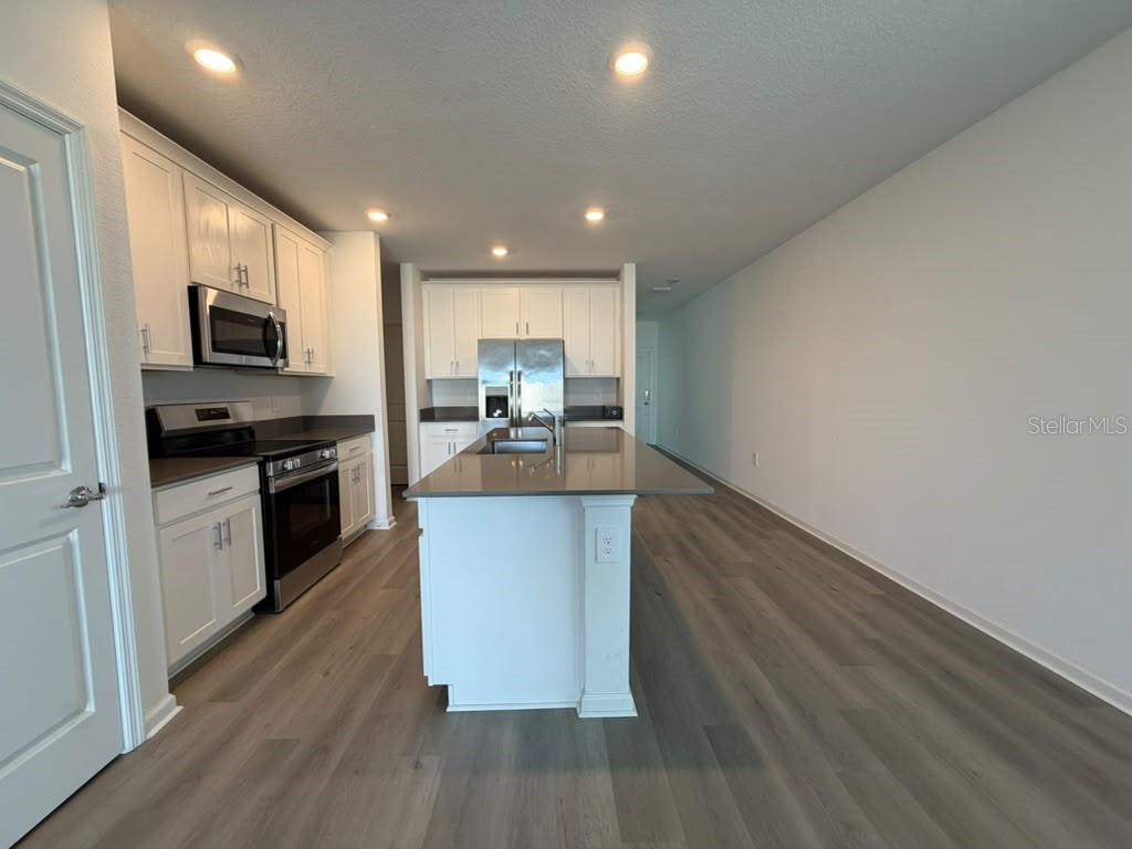 Photo of 2713 Runners Cir, Clermont, FL 34714 (MLS # O6451092)