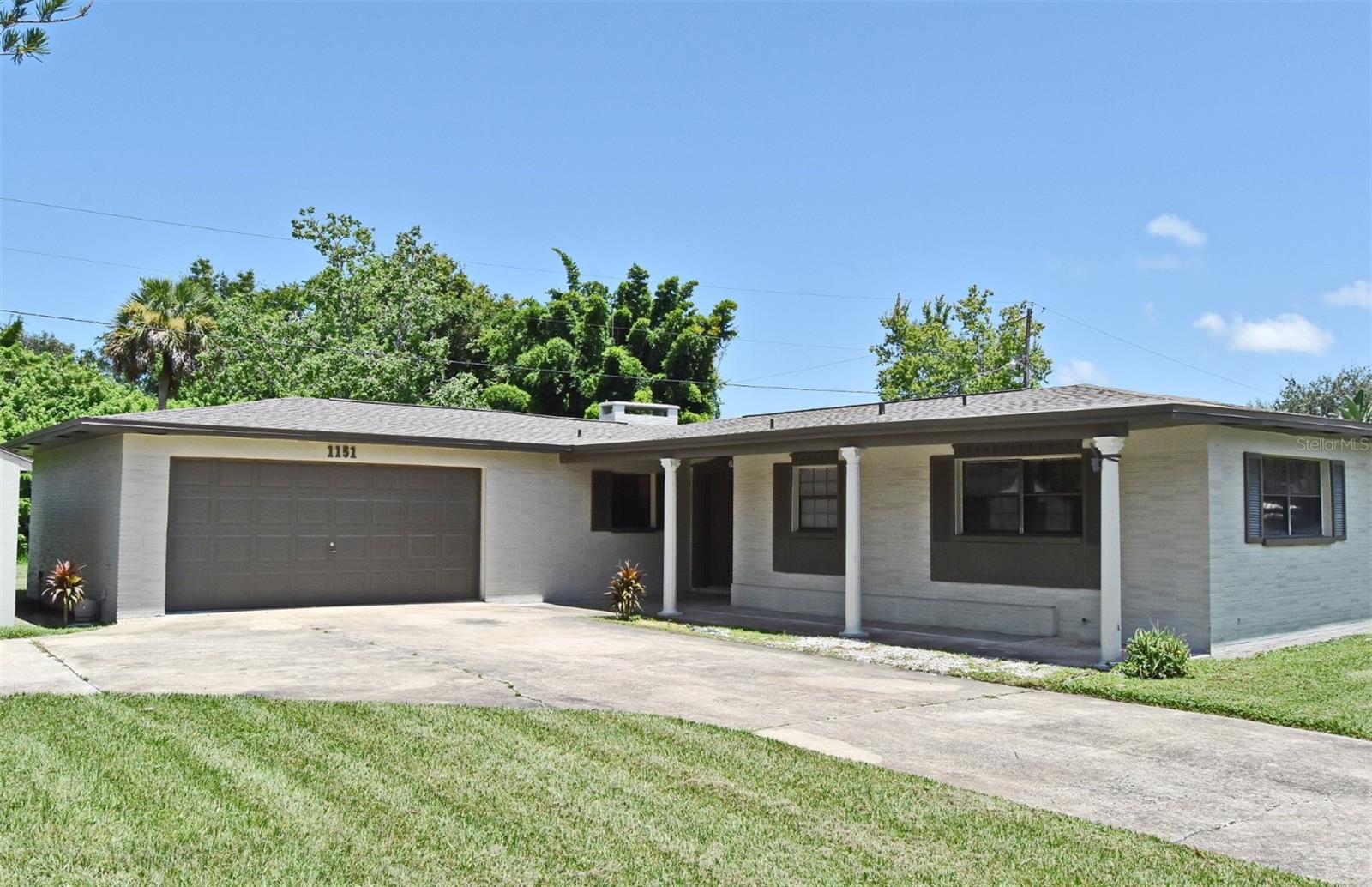 Completely updated 4BR/2BA pool home on a rare double lot with no HOA! This move-in ready property features an open floor plan with a cozy fireplace, tile flooring throughout, and recessed lighting. The kitchen overlooks the living and dining areas and includes brand-new cabinetry, quartz countertops, and stainless steel appliances. Interior laundry room with built-in cabinets and countertop. Fresh interior/exterior paint, updated plumbing, knock-down ceilings, and a NEW roof add to the value. Sliding doors lead to a screened lanai and refinished pool, perfect for entertaining. The expansive backyard and side lot offer room to store a boat, RV, trailer, or other toys. Also includes a large storage shed, 2-car garage, and circular driveway. Conveniently located near shopping, dining, and major highways. Don’t miss this exceptional opportunity! Video Tour: https://www.youtube.com/watch?v=QUYwYi3HiQ4