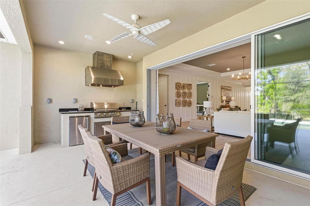 Photo of 33332 Castaway Loop, Wesley Chapel, FL 33543 (MLS # TB8471441)