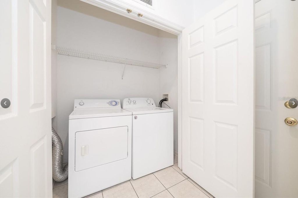 Photo of 6166 Stevenson Drive #302, Orlando, FL 32835 (MLS # O6416716)