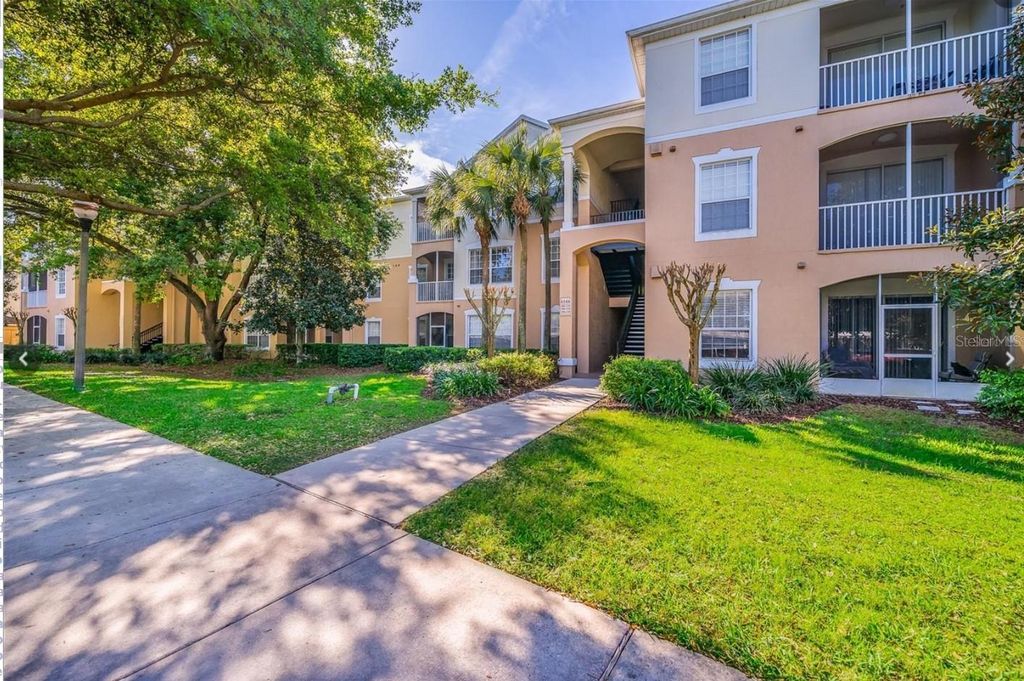 Photo of 6166 Stevenson Drive #302, Orlando, FL 32835 (MLS # O6416716)